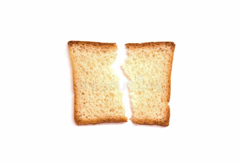 Één gebroken stuk van witte broodtoost ligt op een witte achtergrond stock foto Één gebroken stuk van witte broodtoost ligt op een witte achtergrond stock foto