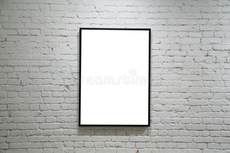 Één zwart frame op witte bakstenen muur stock fotografie Één zwart frame op witte bakstenen muur stock fotografie