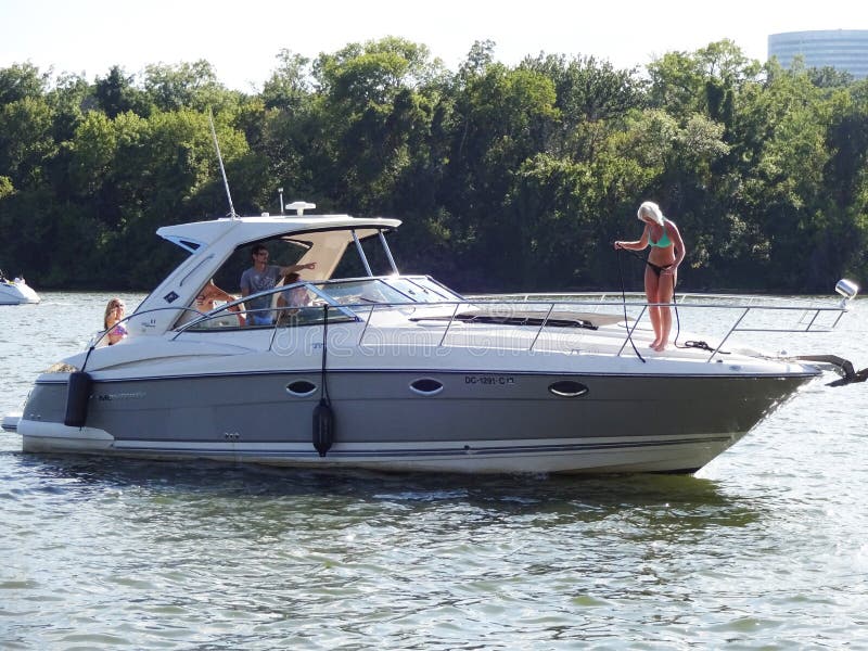 Photo of boat approaching a dock at the georgetown waterfront in washington dc on 9/7/15-labor day. The georgetown waterfront on the potomac river is a popular place for boating. Photo of boat approaching a dock at the georgetown waterfront in washington dc on 9/7/15-labor day. The georgetown waterfront on the potomac river is a popular place for boating.