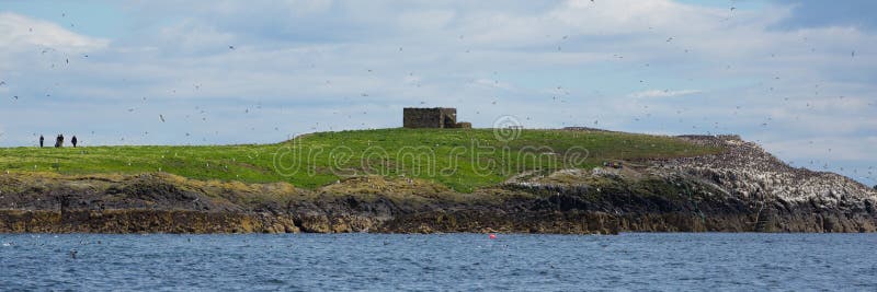 Farne Islands Northumberland England UK approaching from sea panoramic view. Farne Islands Northumberland England UK approaching from sea panoramic view