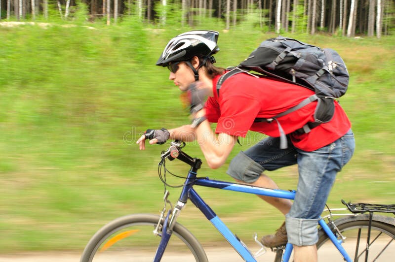 Сyclist tightening helmet