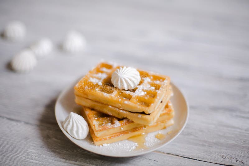 Viennese wafers with honey and powdered sugar. royalty free stock image Viennese wafers with honey and powdered sugar. royalty free stock image