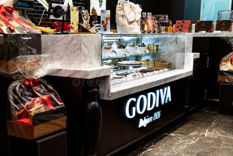 ГОНКОНГ, 9-ое февраля 2019: Godiva было основано в 1926 в Брюсселе, Бельгии, семьей Draps Godiva имеет 23 магазинов розничной тор стоковое фото rf ГОНКОНГ, 9-ое февраля 2019: Godiva было основано в 1926 в Брюсселе, Бельгии, семьей Draps Godiva имеет 23 магазинов розничной тор стоковое фото rf