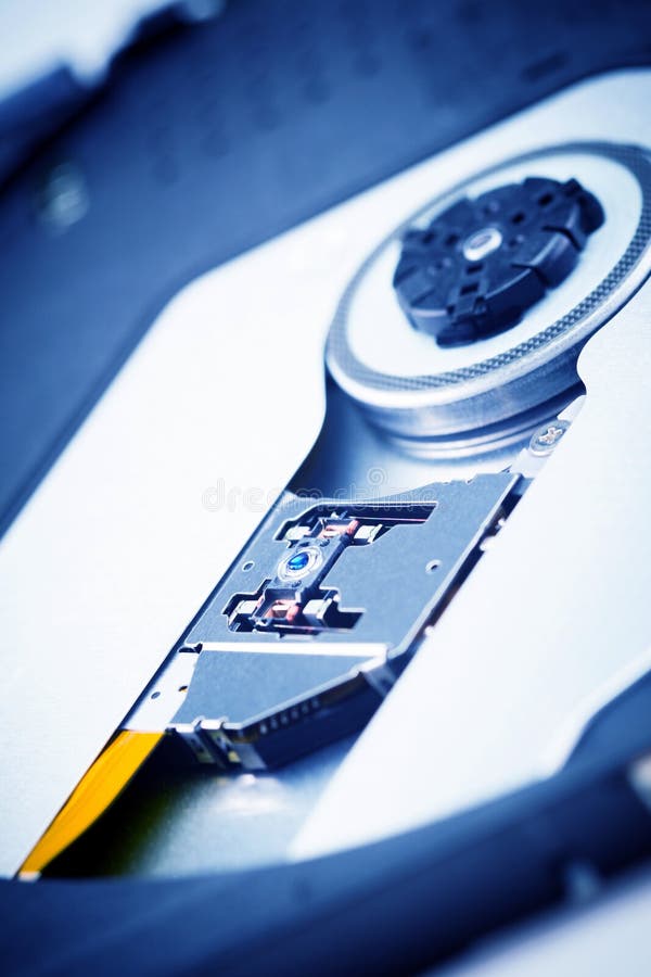 Закройте вверх по - объективу головы лазера привода dvdrw dvd CD оптически стоковые фото Закройте вверх по - объективу головы лазера привода dvdrw dvd CD оптически стоковые фото
