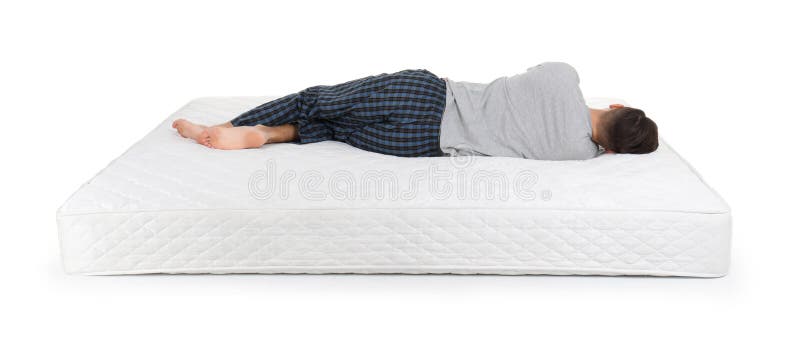 A person lying on a Mattress