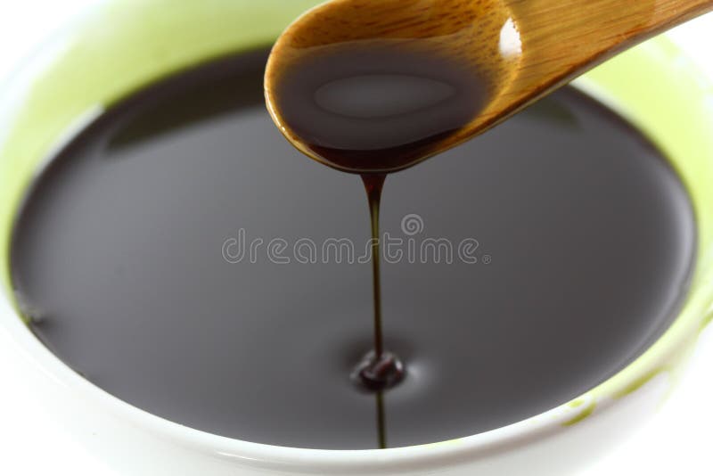 Pumpkin Seed Oil Dripping in a bowl. Pumpkin Seed Oil Dripping in a bowl