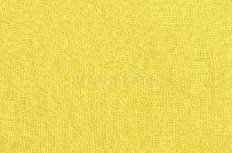 Close up yellow linen texture background. Close up yellow linen texture background