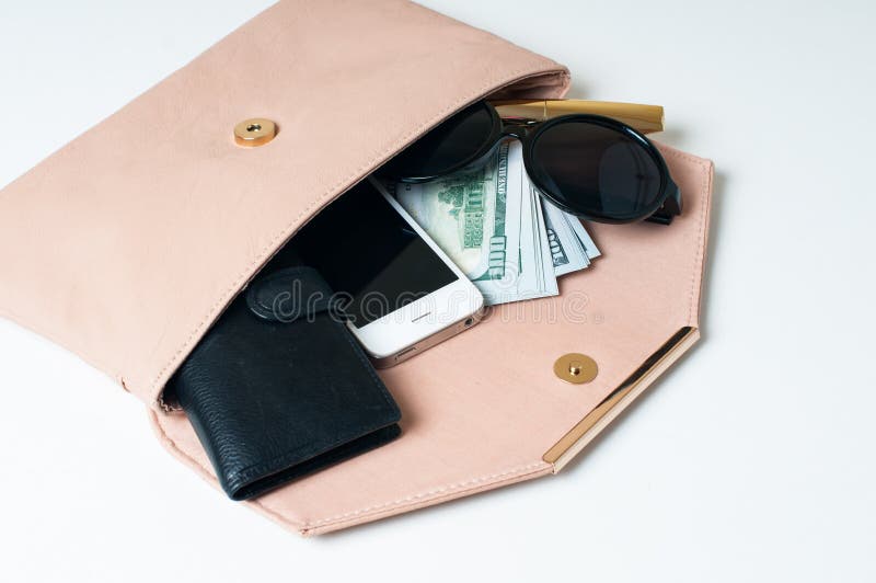 Öffnen Sie die Kupplung der beige Frau stockbild Öffnen Sie die Kupplung der beige Frau stockbild