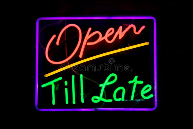 A neon sign of the words 'Open till late'. A neon sign of the words 'Open till late'.