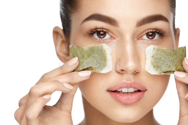 Ögonhudskönhet Ung kvinna med naturlig ansikts- makeup royaltyfri bild