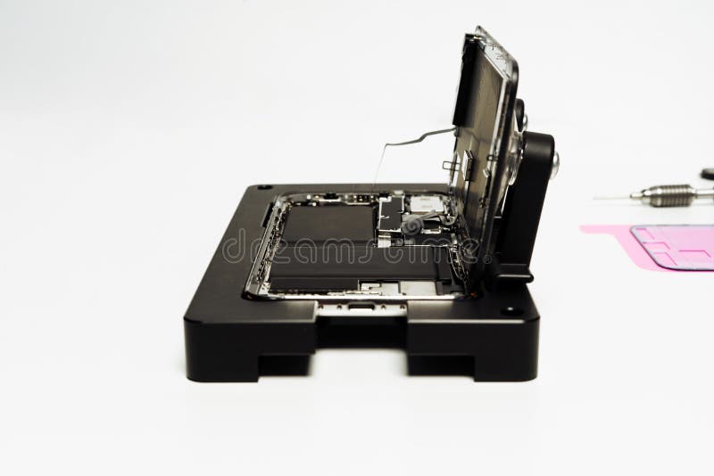 Öppen smart teknologi för reparation för telefonbatteriändring royaltyfri bild Öppen smart teknologi för reparation för telefonbatteriändring royaltyfri bild