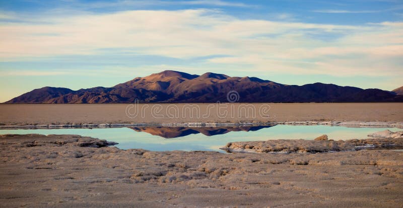 Salinas grandes - large salines on the north of argentina, salta and jujuy provinces . white, flat, salty and dry. Salinas grandes - large salines on the north of argentina, salta and jujuy provinces . white, flat, salty and dry