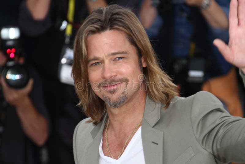 CANNES, FRANCE - MAY 22: Brad Pitt poses at the 'Killing Them Softly' photocall during the 65th Annual Cannes Film Festival at Palais des Festivals on May 22, 2012 in Cannes, France. CANNES, FRANCE - MAY 22: Brad Pitt poses at the 'Killing Them Softly' photocall during the 65th Annual Cannes Film Festival at Palais des Festivals on May 22, 2012 in Cannes, France.