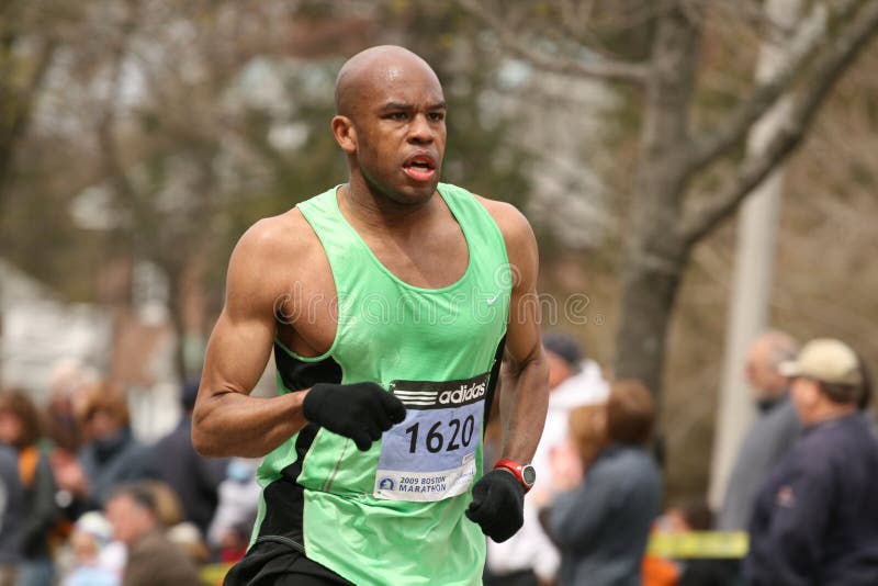 BOSTON - APRIL 20 : Brad Mason races up Heartbreak Hill during the Boston Marathon April 20, 2009 in Boston. About 25,000 runners took part in the 113th edition. BOSTON - APRIL 20 : Brad Mason races up Heartbreak Hill during the Boston Marathon April 20, 2009 in Boston. About 25,000 runners took part in the 113th edition.