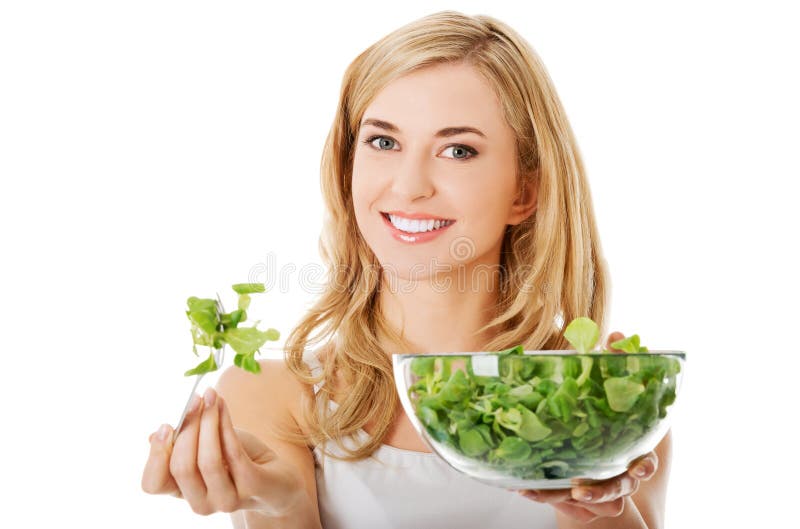 łasowania salat uśmiechnięta kobieta obrazy royalty free łasowania salat uśmiechnięta kobieta obrazy royalty free