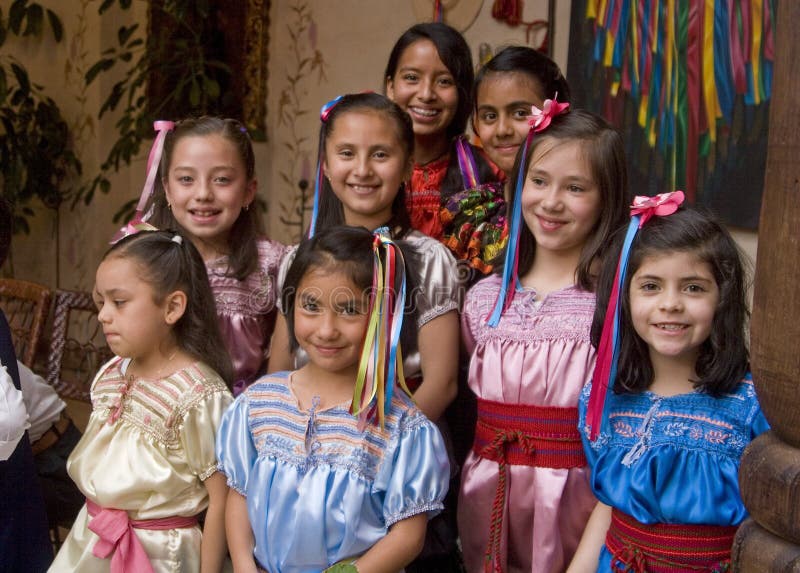 Cute mexican girls with costumes from Chiapas state previous a interpretation of marimba music. The marimba is a popular instrument throughout southern Mexico. Cute mexican girls with costumes from Chiapas state previous a interpretation of marimba music. The marimba is a popular instrument throughout southern Mexico.