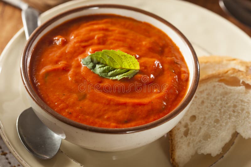 Śmietankowa Pomidorowa basilu Bisque polewka obraz stock Śmietankowa Pomidorowa basilu Bisque polewka obraz stock