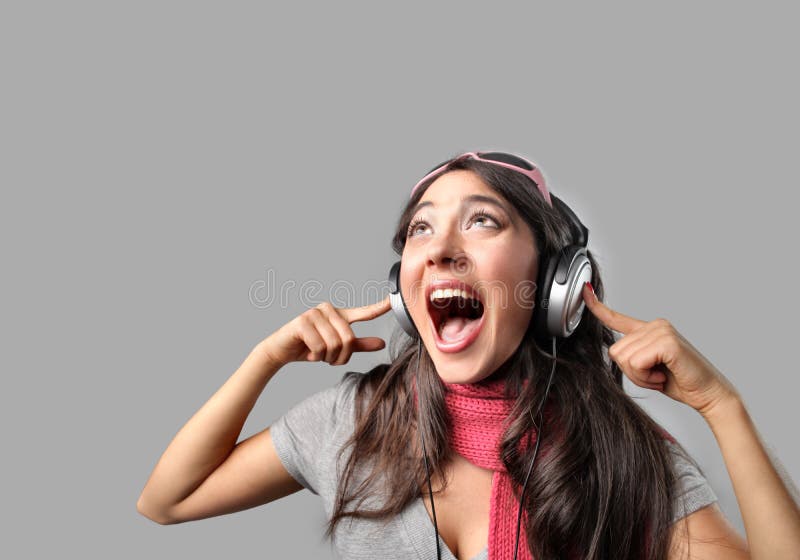 Portrait of Girl with headphones singing. Portrait of Girl with headphones singing