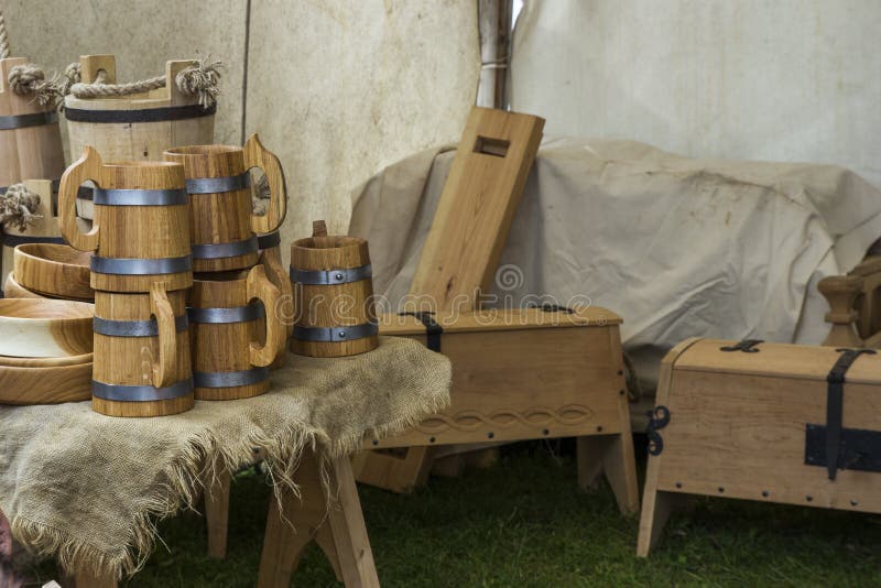 Medieval wooden tankards, boxes and canvas. Medieval wooden tankards, boxes and canvas.