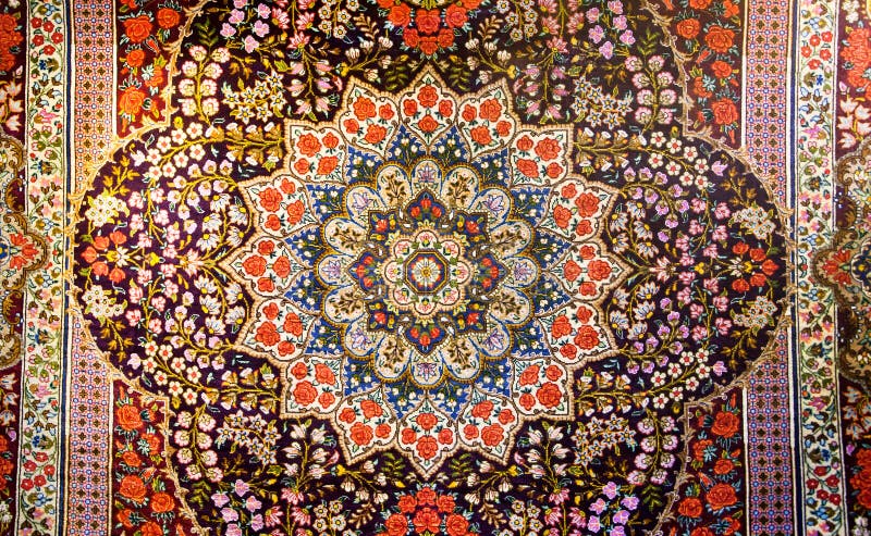 Środkowy czerep piękny orientalny perski dywan z kolorową teksturą