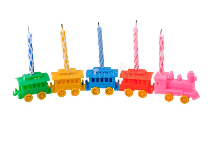 Toy train with celebrate candles isolated on white. Toy train with celebrate candles isolated on white