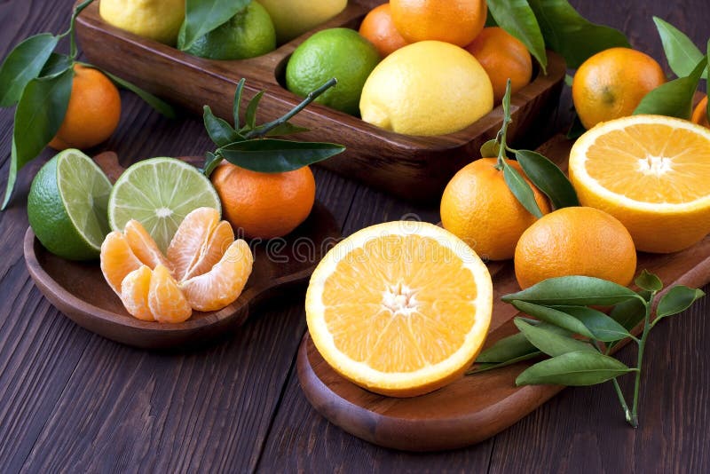 Citrus fruits on wooden background. Citrus fruits on wooden background