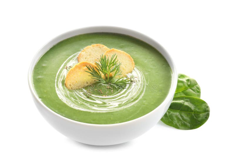 Świeżego warzywa detox polewka robić szpinaki z croutons w naczyniu i liściach zdjęcia stock Świeżego warzywa detox polewka robić szpinaki z croutons w naczyniu i liściach zdjęcia stock