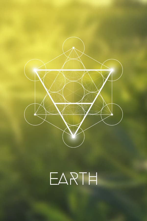 Święty geometrii ziemi elementu symbol wśrodku Metatron sześcianu i kwiatu życie przed naturalnym rozmytym tłem