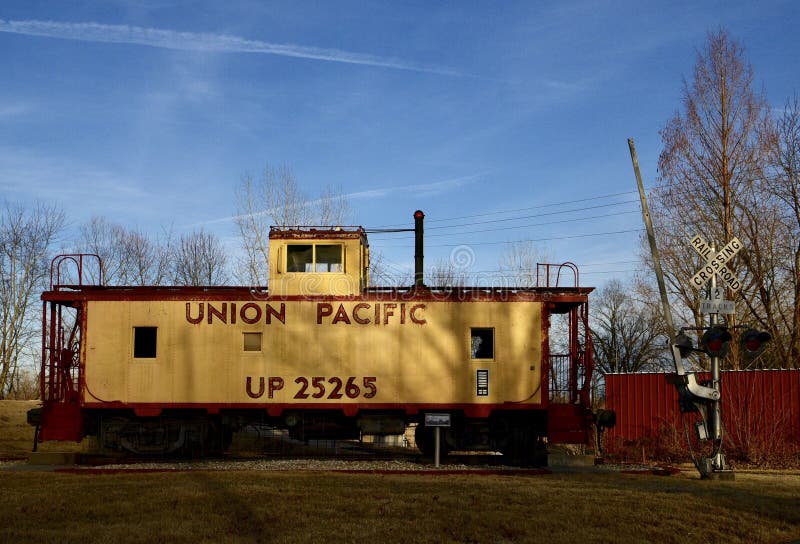 This is a Winter picture of a yellow Caboose located in New Haven, Missouri in Franklin County. This Caboose was built by the Union Pacific Railroad, it was a Class CA 5 Caboose, it was a had a riveted Steel body, it was built in 1942. This picture was taken on February 16, 2018. This is a Winter picture of a yellow Caboose located in New Haven, Missouri in Franklin County. This Caboose was built by the Union Pacific Railroad, it was a Class CA 5 Caboose, it was a had a riveted Steel body, it was built in 1942. This picture was taken on February 16, 2018.