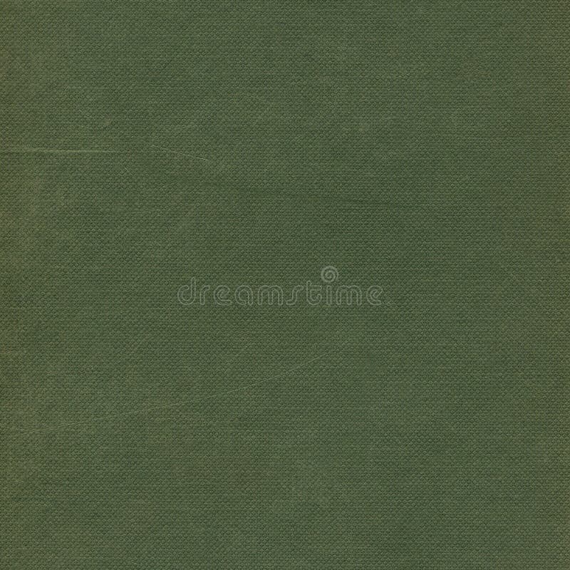 țesătura din bumbac calico-verde de măsline, de culoare verde-închis, se uită la fundalul pastei rustice palide, cu textură zgâria royalty free stock photography