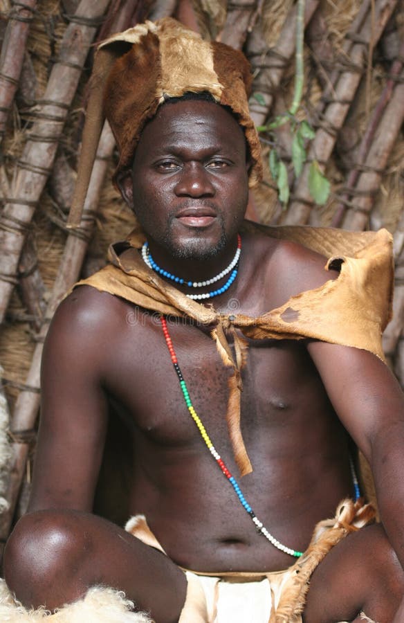 People of Africa. African Tribal shaman posing in his hut. South Africa. People of Africa. African Tribal shaman posing in his hut. South Africa