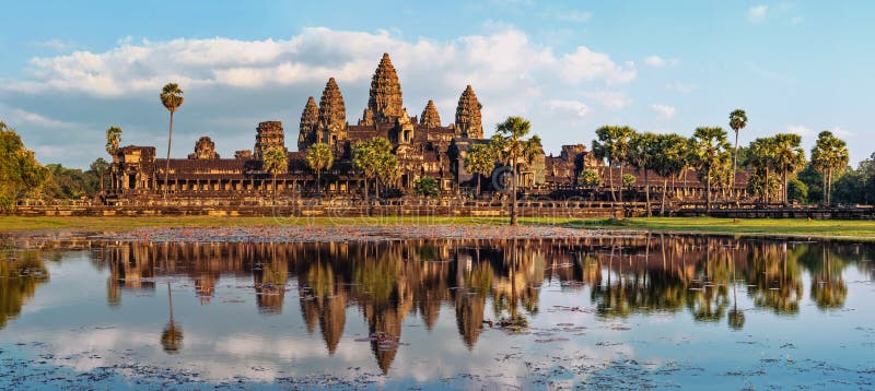 Ancient Khmer architecture. Panorama view of Angkor Wat temple at sunset. Siem Reap, Cambodia. Ancient Khmer architecture. Panorama view of Angkor Wat temple at sunset. Siem Reap, Cambodia