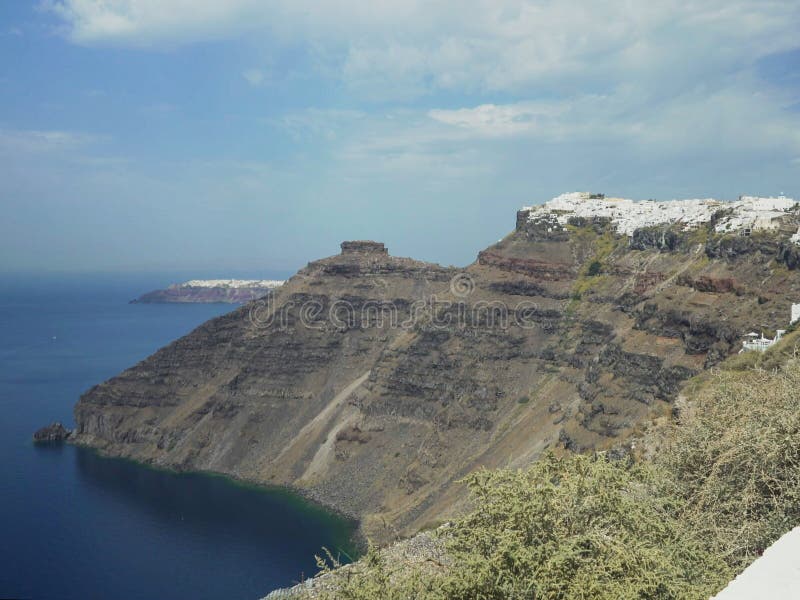 Άποψη πρωινού του imerovigli και oia από το fira, santorini στοκ φωτογραφίες με δικαίωμα ελεύθερης χρήσης Άποψη πρωινού του imerovigli και oia από το fira, santorini στοκ φωτογραφίες με δικαίωμα ελεύθερης χρήσης