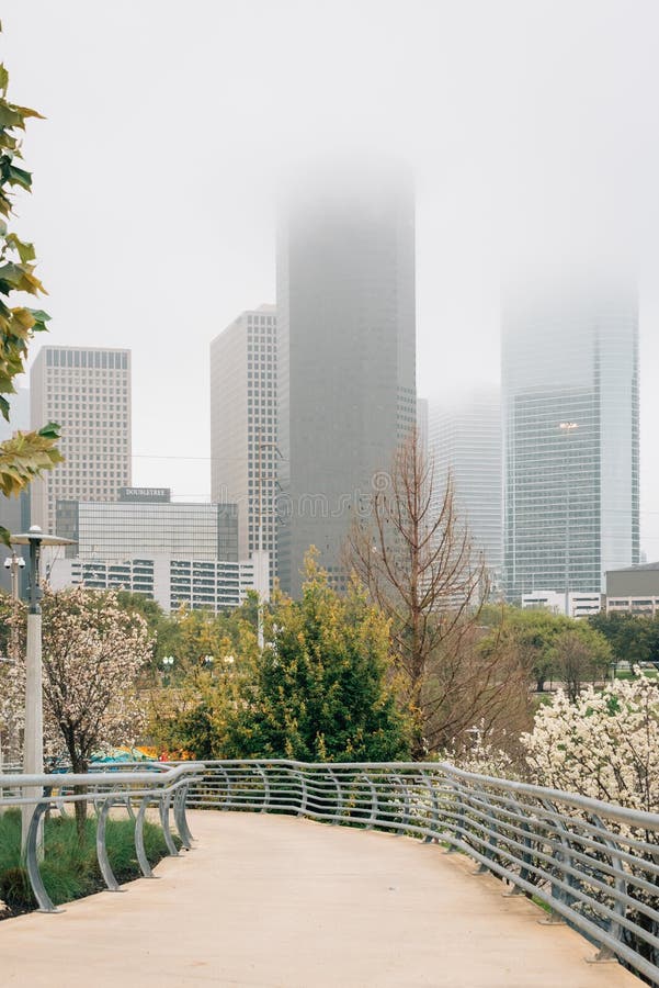 View of the Houston skyline in fog, from Buffalo Bayou Park in Houston, Texas. View of the Houston skyline in fog, from Buffalo Bayou Park in Houston, Texas.