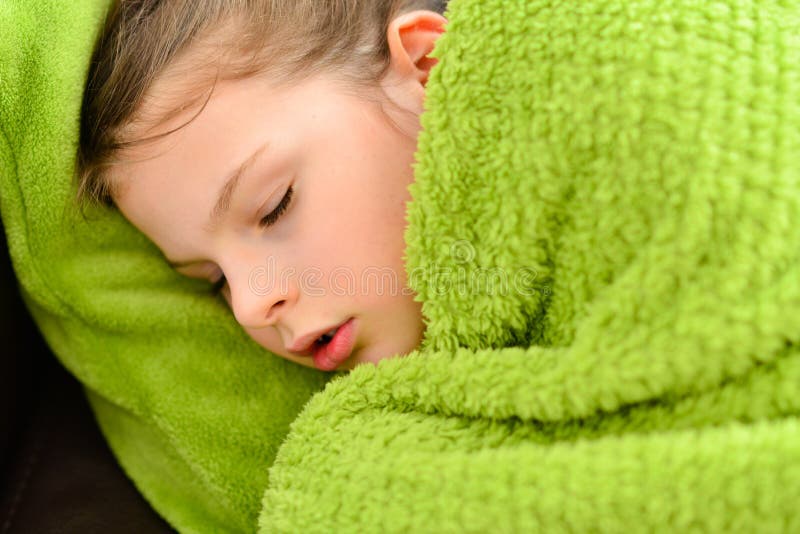 Sick child. Sick sweet little girl under a blanket. Sick child. Sick sweet little girl under a blanket