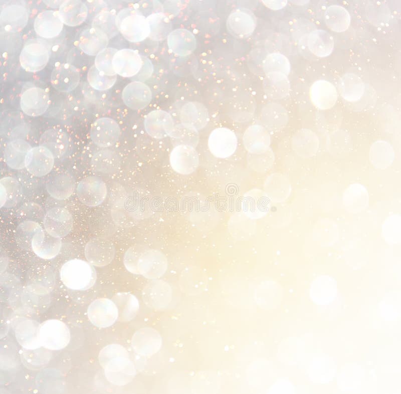 Άσπρα ασημένια και χρυσά αφηρημένα φω'τα bokeh background defocused στοκ εικόνες Άσπρα ασημένια και χρυσά αφηρημένα φω'τα bokeh background defocused στοκ εικόνες