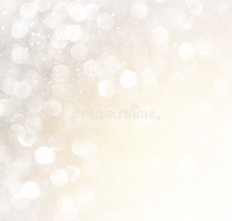 Άσπρα ασημένια και χρυσά αφηρημένα φω'τα bokeh background defocused στοκ εικόνες