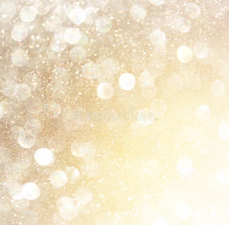 Άσπρα ασημένια και χρυσά αφηρημένα φω'τα bokeh background defocused στοκ εικόνα