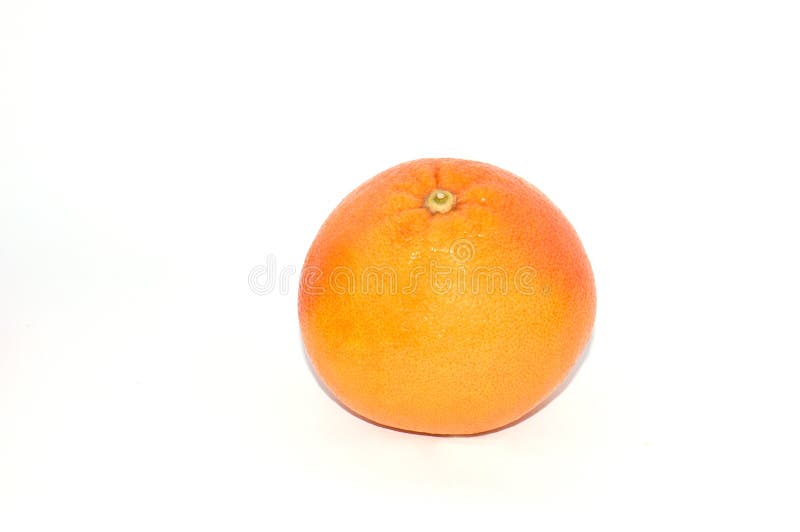 Ένα tangerine σε μια άσπρη κινηματογράφηση σε πρώτο πλάνο υποβάθρου στοκ φωτογραφίες Ένα tangerine σε μια άσπρη κινηματογράφηση σε πρώτο πλάνο υποβάθρου στοκ φωτογραφίες