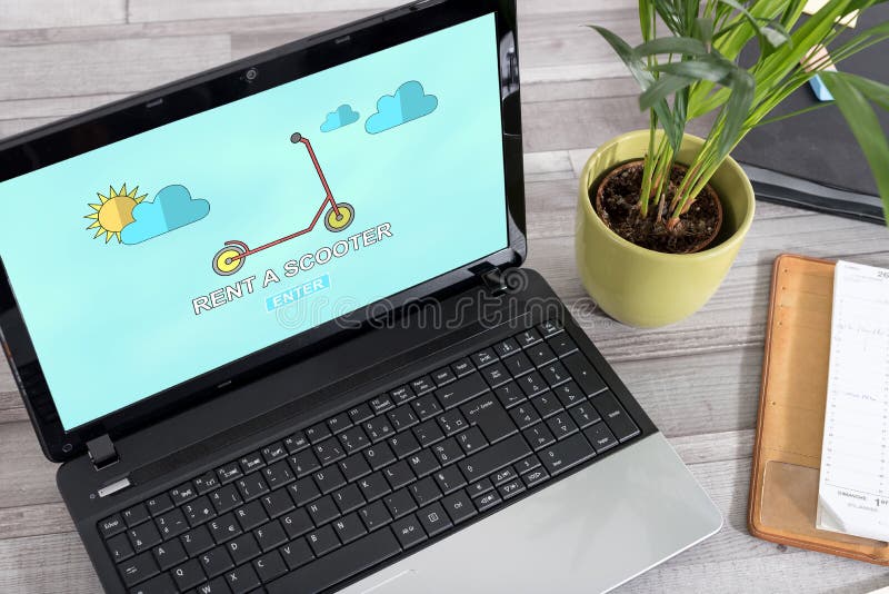 Έννοια ενοικίου μηχανικών δίκυκλων σε ένα lap-top στοκ φωτογραφία