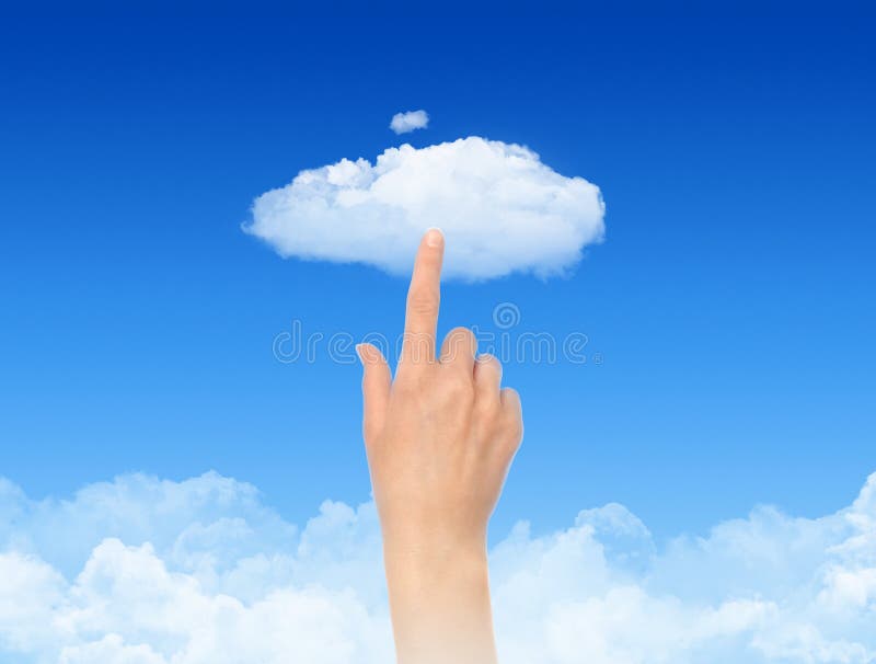 Woman hand touch the cloud against blue sky with clouds. Concept image on cloud computing and eco theme. Woman hand touch the cloud against blue sky with clouds. Concept image on cloud computing and eco theme.