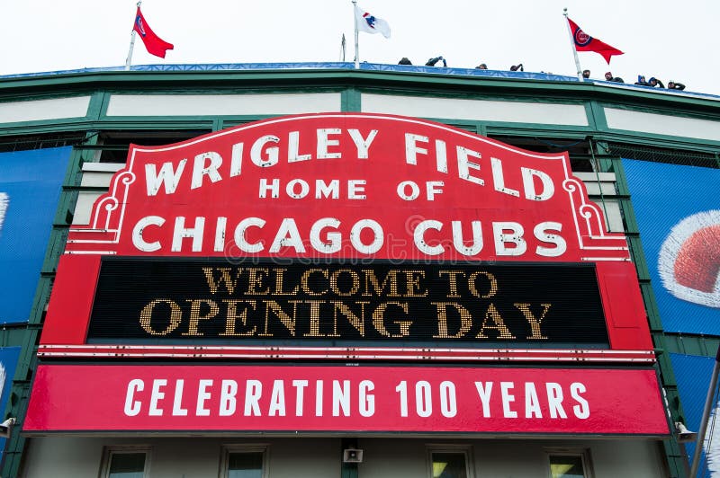 CHICAGO - APRIL 4: The Wrigley Field marquee welcomes Cubs fans to opening day on April 4, 2014 in Chicago. The 2014 season marks the 100th year for the historic ballpark. CHICAGO - APRIL 4: The Wrigley Field marquee welcomes Cubs fans to opening day on April 4, 2014 in Chicago. The 2014 season marks the 100th year for the historic ballpark.