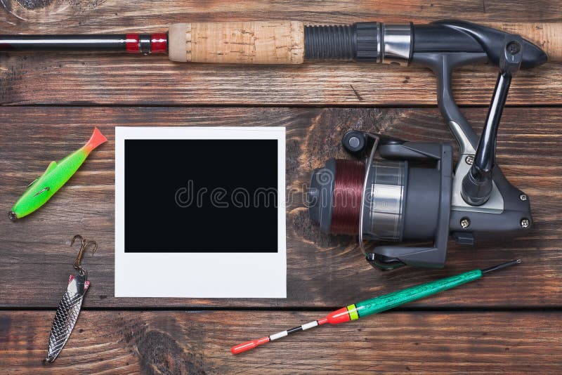 Αλιεύοντας εξοπλισμός και photoframe στοκ εικόνες Αλιεύοντας εξοπλισμός και photoframe στοκ εικόνες