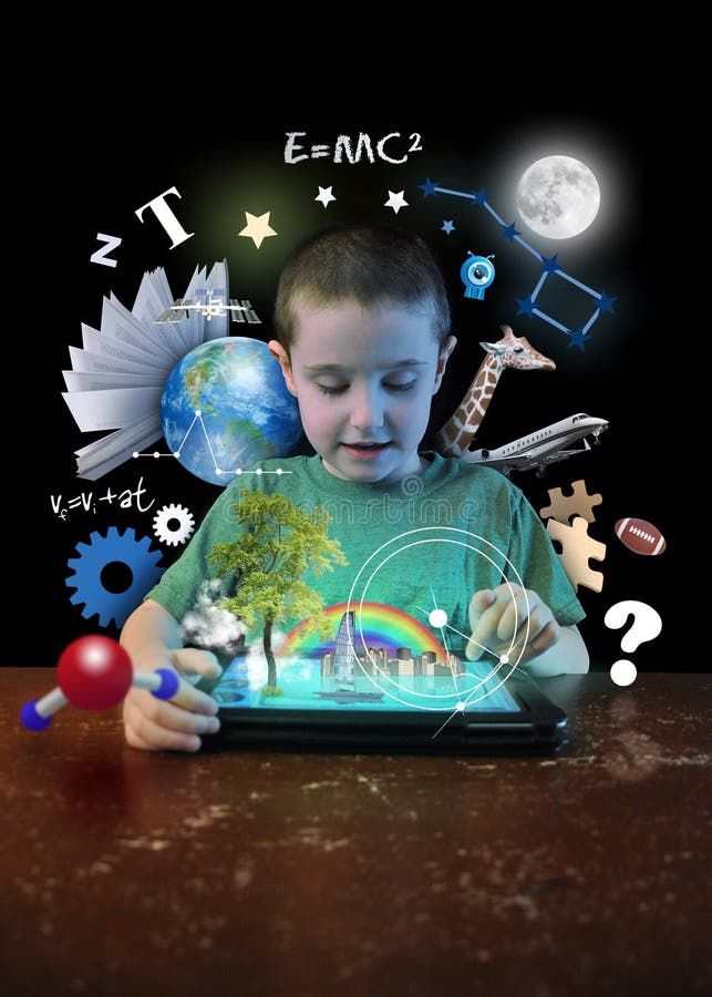 A young boy child is looking at a computer tablet with math, science and animals around him on a black background for a school learning or technology concept. A young boy child is looking at a computer tablet with math, science and animals around him on a black background for a school learning or technology concept.