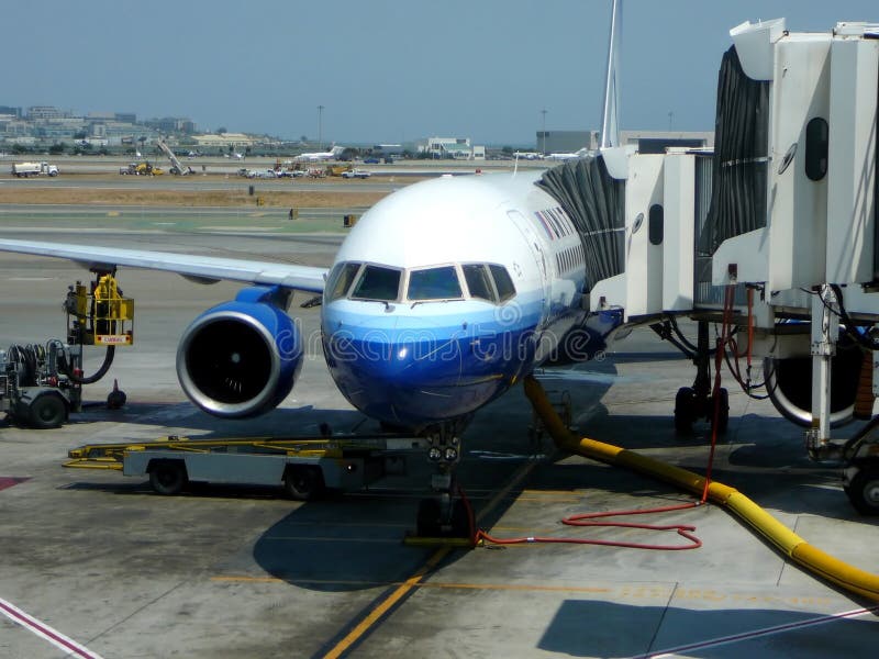 Passenger jet at airport terminal gate. Passenger jet at airport terminal gate