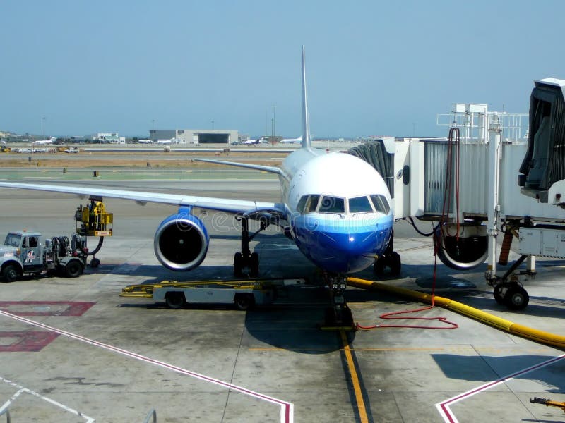 Passenger jet at airport terminal gate. Passenger jet at airport terminal gate