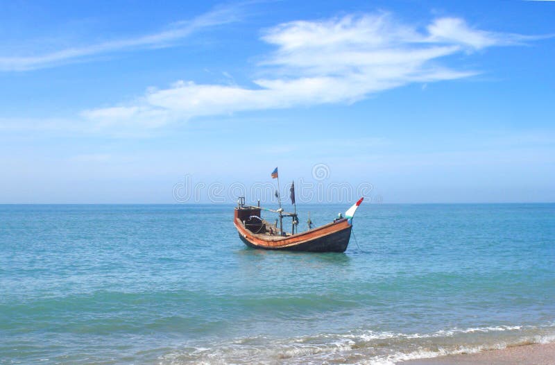 Traditional fishing boat at the shore of the Saint Martins island of Bangladesh. Traditional fishing boat at the shore of the Saint Martins island of Bangladesh