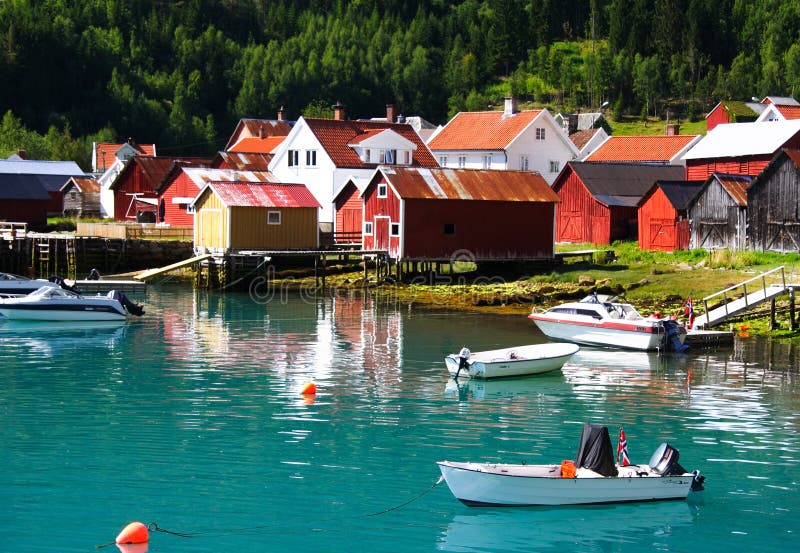 Boat and fishing cabins, naeroeyfjorden, sognefjorden, Norway. Unesco world heritage. Boat and fishing cabins, naeroeyfjorden, sognefjorden, Norway. Unesco world heritage