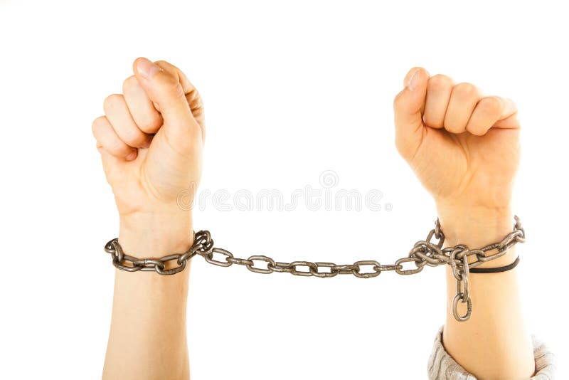 Αλυσοδεμένα χέρια με αλυσίδα γύρω από τους καρπούς στοκ φωτογραφίες με δικαίωμα ελεύθερης χρήσης Αλυσοδεμένα χέρια με αλυσίδα γύρω από τους καρπούς στοκ φωτογραφίες με δικαίωμα ελεύθερης χρήσης