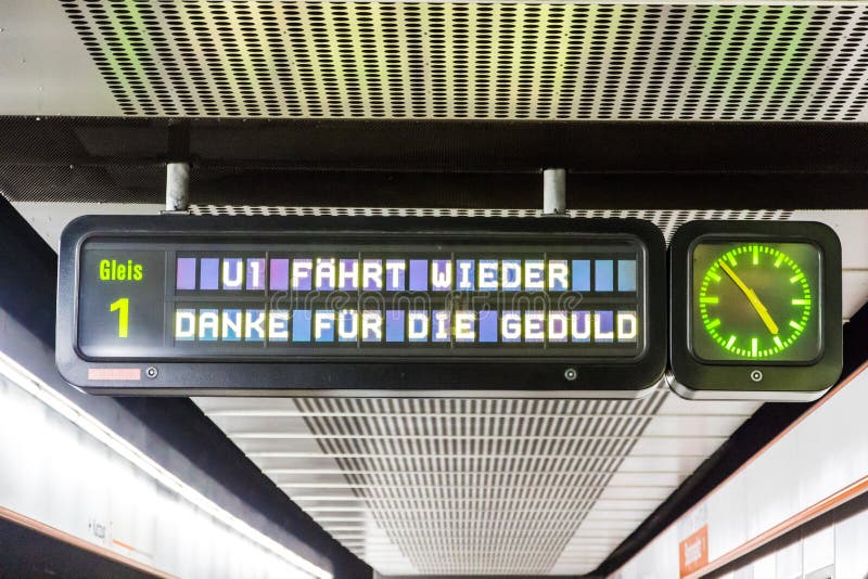 Vienna, Austria - December 20, 2019: metro station variable message sign reading `Platform 1. U1 runs again Thanks for the patience` after the stop of December 16 due to a fire accident. Vienna, Austria - December 20, 2019: metro station variable message sign reading `Platform 1. U1 runs again Thanks for the patience` after the stop of December 16 due to a fire accident